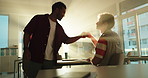 University, fist bump and students in classroom for lesson, learning and tutor session for exam. Friends, college and men with flare and greeting gesture for school assignment, education and studying