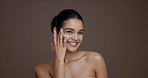 Face, skincare cream and woman with beauty, sunscreen application or glow on studio background space. Portrait, smile and apply facial lotion for cosmetics, dermatology and hydration for self care