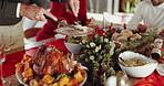 Christmas dinner, hands and cutting chicken for festive holiday or celebration in family home. Party, food and people with knife for lunch, healthy meal and serving for xmas tradition or thanksgiving