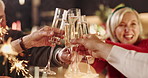 Champagne, cheers and happy family in home for christmas celebration, party or gathering together. Smile, toast and people in dining room with sparkling wine for xmas event in festive season at house
