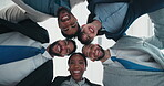 Face, group and hug for collaboration in office, smile and solidarity in corporate company or unity. Low angle, colleagues and people with partnership for mission, teamwork and embrace in business