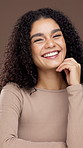 Happy, makeup and face of woman in studio for natural, cosmetics or facial beauty with glow. Smile, confident and portrait of person from Brazil with cosmetology for self care by brown background.