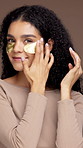 Face, skincare and woman with eye patch, confident and hydration benefits for healthy skin and glow. Studio background, wellness and person with mask for beauty, anti aging or product for dermatology