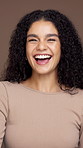 Spray, makeup and face of woman in studio for natural beauty, self care and glow. Aesthetic, shine and cosmetology with portrait of model on brown background for setting product, smile and grooming