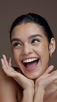 Excited, beauty and face of woman in studio for skincare results, cosmetics and facial treatment. Salon, dermatology and portrait of person with natural glow, shine or wellness on brown background