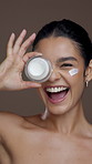 Skincare, jar and face of woman with cream for moisturizing, anti aging and skin hydration. Dermatology, studio background and portrait of person with lotion container for beauty, wellness and health
