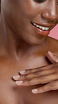 Body care, beauty and black woman in studio with natural, glow or hydration for smooth skin. Happy, wellness and African female person with silky dermatology for cosmetics routine by pink background.