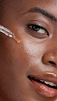 Happy, face and woman with serum for self care, skincare or anti aging with cosmetic or moisturizer. Studio background, black person and facial treatment for healthy skin, wellness or hyaluronic acid