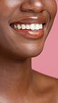Beauty, mouth and smile of black woman in studio for dental care, oral hygiene or satisfaction. Skin, teeth and whitening with happy African model isolated on pink background for orthodontics results