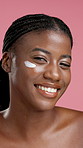 Cream, pink background and face of black woman for skincare, facial and anti aging cosmetics. Dermatology, studio and portrait of person with lotion, spf and moisturizer for hydration, glow or beauty
