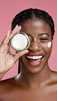 Cream, jar and face of black woman for skincare, facial and anti aging cosmetics in studio. Dermatology, pink background and portrait of person with lotion for moisturizer, hydration and beauty