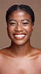 Happy, face and black woman with beauty in studio for skincare, cosmetology on a brown background. Portrait, female person or model with teeth, smile or shine for facial makeup, treatment or glow up