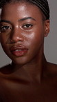 Face, woman and proud for skincare in studio of natural beauty, smooth texture and glow results. African person, lighting and facial cosmetics, treatment aesthetics and dermatology on gray background