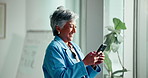 Happy, phone and business woman in office for typing message, social networking and contact. Professional, corporate and mature person on smartphone for website, email and communication on mobile app