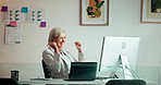 Business, celebration and woman with computer, cheering and email with profit increase. Mature person, investment and employee in workplace, pc and success with achievement, stock market and new deal