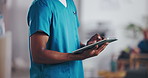 Hands, man and nurse in clinic, tablet and typing with digital app, medical service and research. Closeup, person and professional in workplace, tech and network with online schedule and healthcare