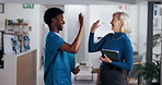 Happy, colleagues and high five for success, hospital and good news for healthcare, nurse and woman. Celebration, gesture or people with smile for achievement in clinic, administrator and specialist