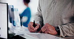 Person, hands or patient writing with document for medical application, insurance or survey. Closeup, client and filling in paperwork with pen or form for healthcare appointment or help at front desk