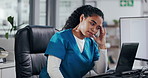 Frustrated woman, nurse and receptionist with headache on laptop for stress, overworked or pressure. Female person, medical worker or secretary with migraine or strain on computer at front desk