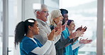 People, applause and doctors in workplace, celebration and smile with medical milestone. Group, announcement and professional in clinic, clapping and success with research achievement and opportunity
