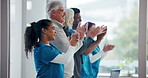 People, applause and doctors in hospital, celebration and smile with medical milestone. Group, employees and professional in clinic, clapping and success with research achievement and announcement