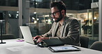 Business, man and laptop in office at night for accounting, finance planning and budget report. Male person, typing and pc with financial email, audit feedback and information for investment deadline