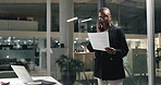 Business, phone call and black woman with documents, night and laptop with financial agency. African person, evening or employee with paperwork cellphone or schedule for trading, app or budget review