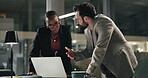People, talking and laptop in office at night for planning, finance report and accounting research. Staff, team and feedback with pc for financial audit, budget proposal and information for deadline