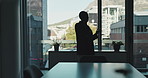 Business, phone call and woman in office, window and communication with attorney. Employee, person and lawyer in workplace, smartphone and conversation with confidentiality, court case and legal aid
