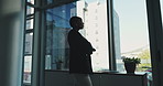 Business, thinking and woman with arms crossed, window  or pride in workplace, accounting or choice. Person, financial agency or employee in office, decision or solution with view, idea or confidence