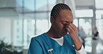 Woman, headache or stress with eye strain in hospital for mistake, pressure or anxiety. Sad, female person or medical worker with migraine or pain for fail deadline or depression in healthcare clinic