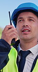 City, civil engineer and man with radio, talking and planning for building progress or architecture. Outdoor, employee or person with tech for construction work, communication or property development