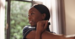 Black woman, wake up and stretching in bedroom, and happy and breathing with circulation in home. African person, smile and warmup arms for health, muscle or perspective by window in morning at house