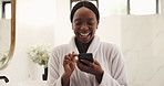 Bathroom, phone and black woman laugh with morning routine, scroll message or social media. Robe, home and happy person with mobile for funny meme, spa blog and reading text with comedy on internet