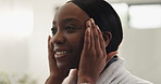 Happy, black woman and skincare with face cream in bathroom for moisturizer or cosmetics in home. Female person, smile or beauty with facial lotion for anti aging, treatment or soft skin in house