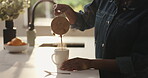 Pouring, coffee and hands with cup, kitchen and preparing breakfast to start day or morning routine. Hot, beverage or person with caffeine on counter in home, liquid or equipment for tea in apartment
