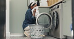 Smelling, laundry and woman with chores, home or spring cleaning on weekend, fragrance and material. Fresh, scent and black person with routine in house, housework and hygiene for fabric and cloth