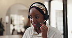 Headset, remote work and black woman in home talking for online help, virtual assistance or advice. Receptionist, consultant and person on tech for customer service, crm support and contact us