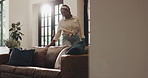 Black woman, housekeeping or interior design with sofa for cleaning, renovation or home improvement. Female person, maid or cleaner with couch for furniture choice, selection or comfort in house