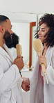 Couple, fun and singing with brush in bathroom, dancing and excited with voice, bonding and love. People, woman and man with karaoke, song or playful with performance with morning routine at house