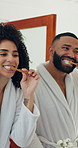 Couple, brushing teeth and happy in bathroom, mirror or cleaning mouth for morning routine in home. Man, woman and bamboo toothbrush with oral health, benefit or dental hygiene with sustainability