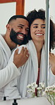 Mirror, beauty and happy couple hug in bathroom for support, morning routine and laugh. Reflection, man and woman in home with embrace for hygiene, skincare and funny conversation for love together