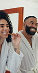 Couple, brushing teeth and laugh in bathroom, mirror or cleaning mouth for morning routine in home. Man, woman and bamboo toothbrush with oral health, benefit or dental hygiene with sustainability