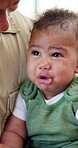Family, father and comfort crying baby in home from wake up, frustrated and hungry. Single dad, man and attention to sad kid for infant care, emotional child and console with parenting and connection