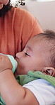 Mother, bottle and feeding baby in home with play, airplane or dairy for nutrition with benefits. Woman, mom and infant child with drink, milk or formula for growth with bonding at family house
