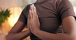 Prayer hands, yoga and woman in home for breathe exercise, meditation and mindfulness. Holistic, routine and person with calm, zen energy and peace for wellness, mental health and balance in house