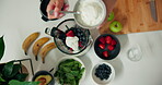 Hands, smoothie and woman with yoghurt in blender for breakfast drink, recipe or meal replacement. Above, person and prepare fruit ingredients in home for organic shake, digestive health and vitamins