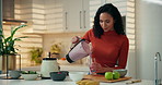 Woman, smoothie or kitchen with glass for diet, nutrition or natural organic drink in home. Female person, nutritionist or weight loss with milkshake, fruit or blender for vitamins, fiber or wellness