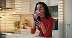 Happy, woman and smoothie with phone in kitchen for breakfast shake, nutrition and reading text. Home, person and smartphone with meal replacement drink for healthy benefits and social media scroll