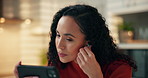 Home, earphones and woman with smartphone, listening to music and audio with social media. Apartment, mobile user or person with happiness, cellphone and sound with radio, smile or streaming for song